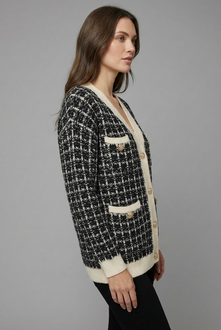 Textured tweed women's cardigan with elegant gold button details, a versatile and warm knitwear piece.