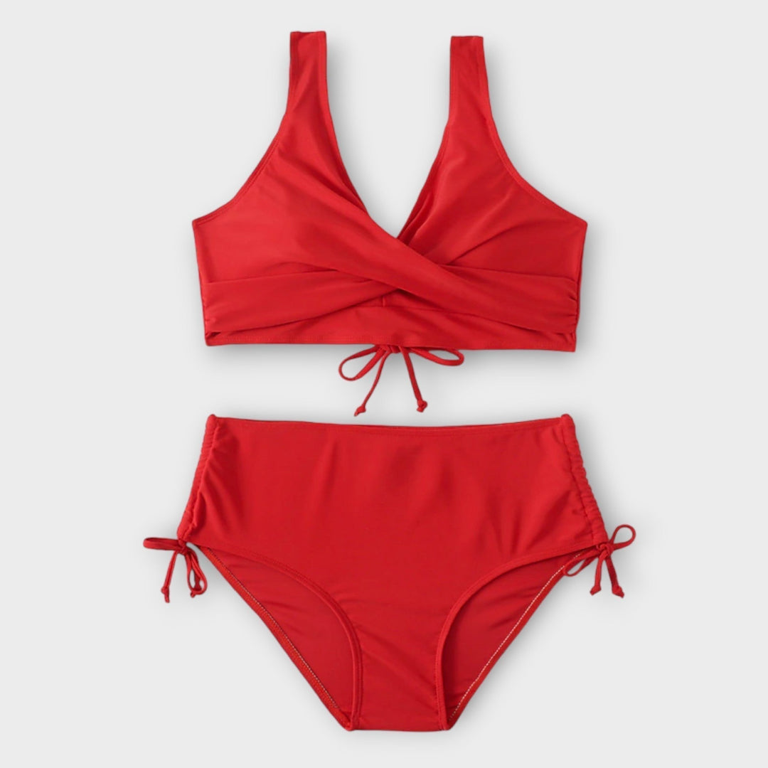 Vibrant red two-piece bikini, an elegant and stylish holiday essential for women's summer beachwear.