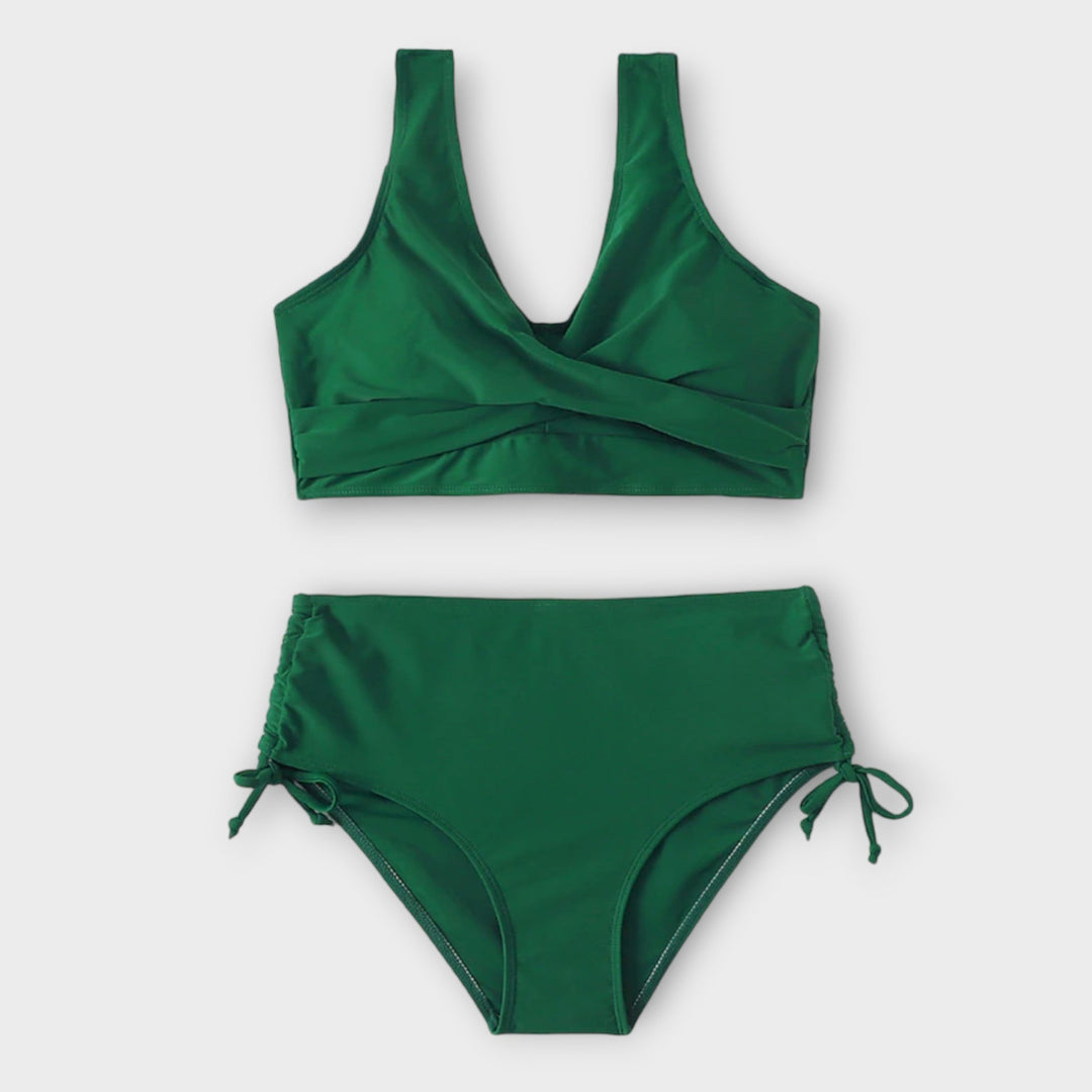 Classic black two-piece women's bikini. Flattering swimwear for an elegant poolside look or beach fashion.