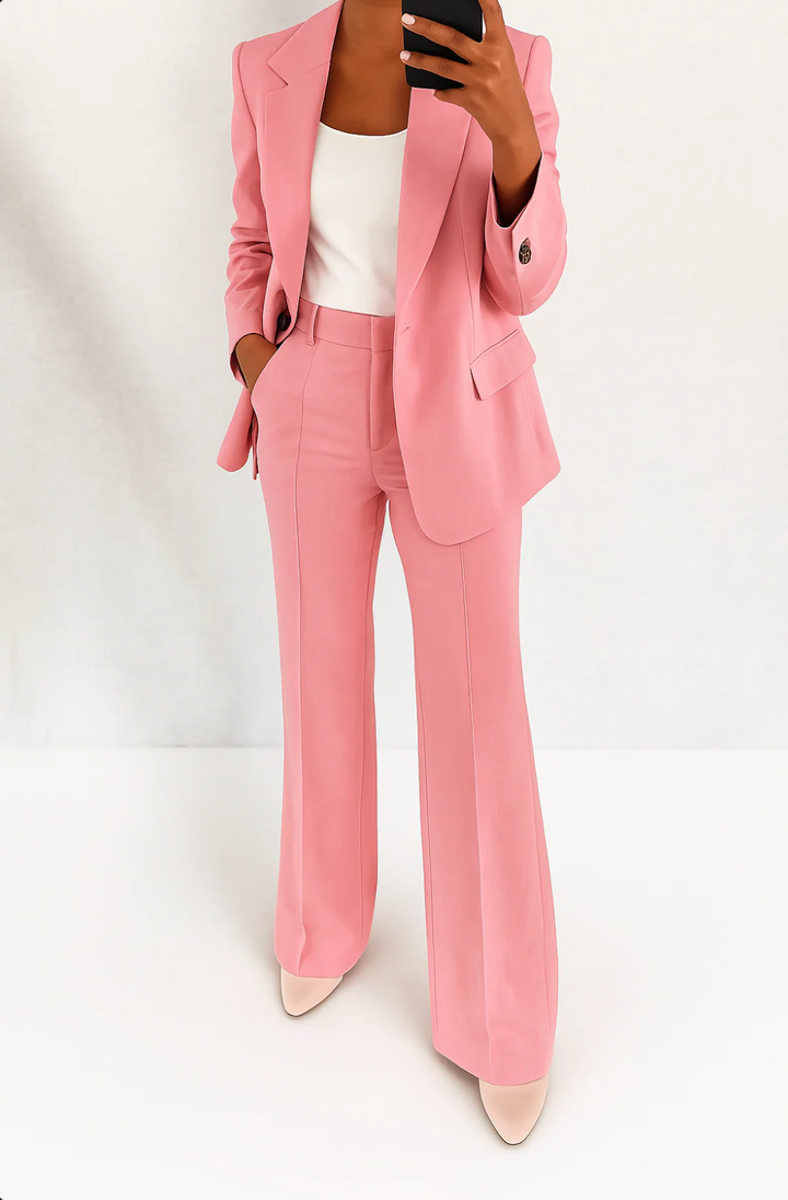 Comfortable and elegant women's two-piece suit, featuring a long sleeve blazer and chic trousers.