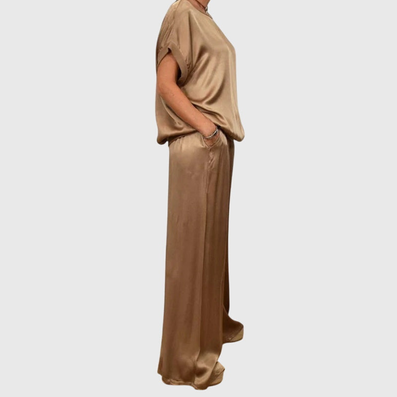 Chic women's matching two-piece set: elegant loungewear featuring a comfortable top and wide-leg pants ensemble.