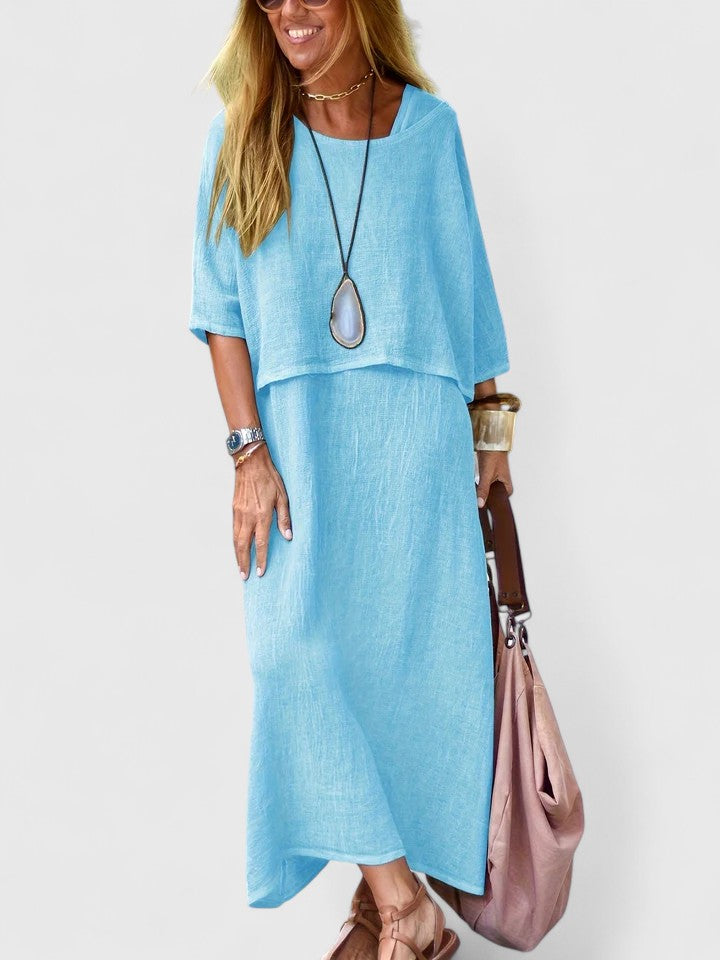Grey women's elegant two-piece set, comfortable top and skirt outfit for day to night wear.