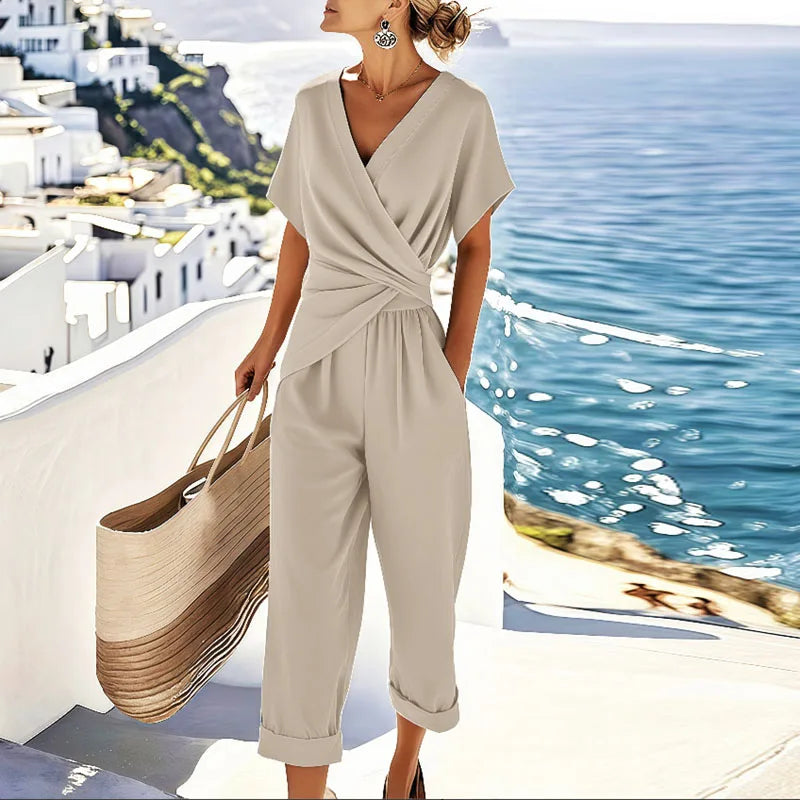 Elegant women's two-piece set featuring a chic wrap top with V-neck and stylish straight-leg trousers, perfect for summer.