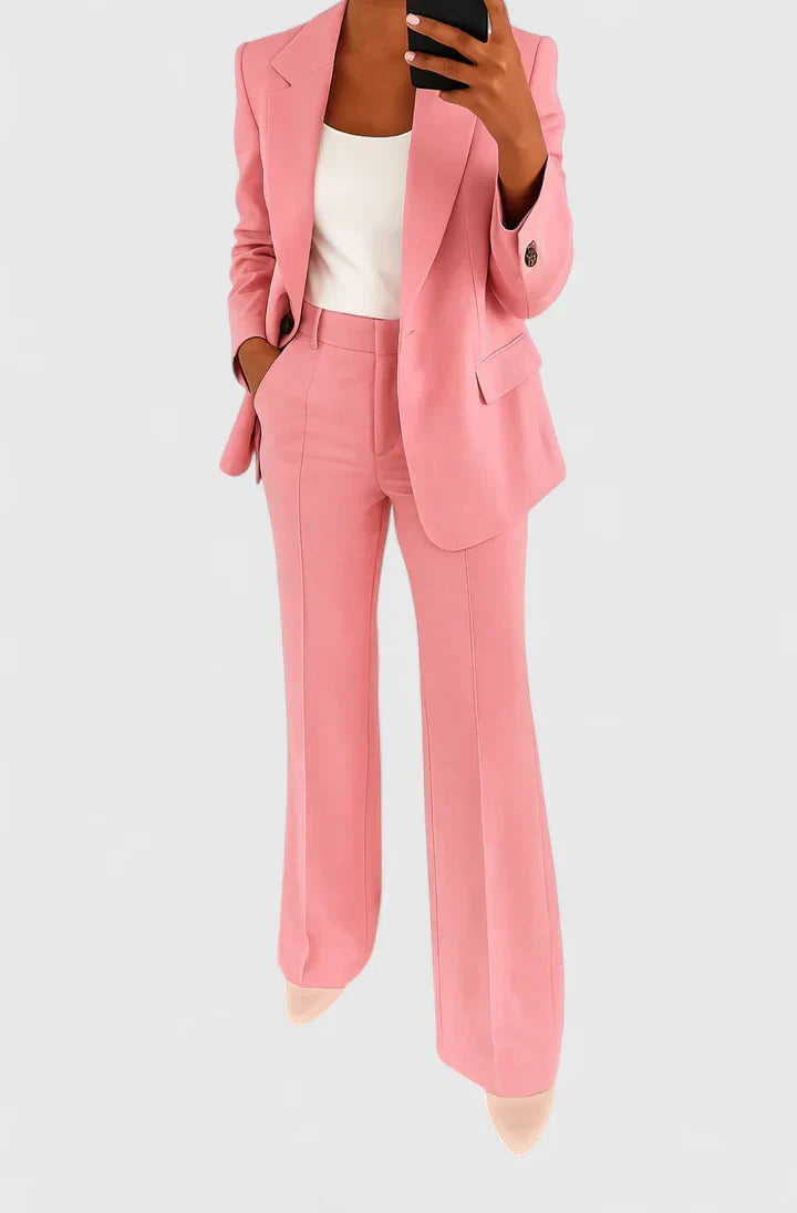 Modern women's two-piece ensemble. This chic and versatile suit set offers professional and business casual style.