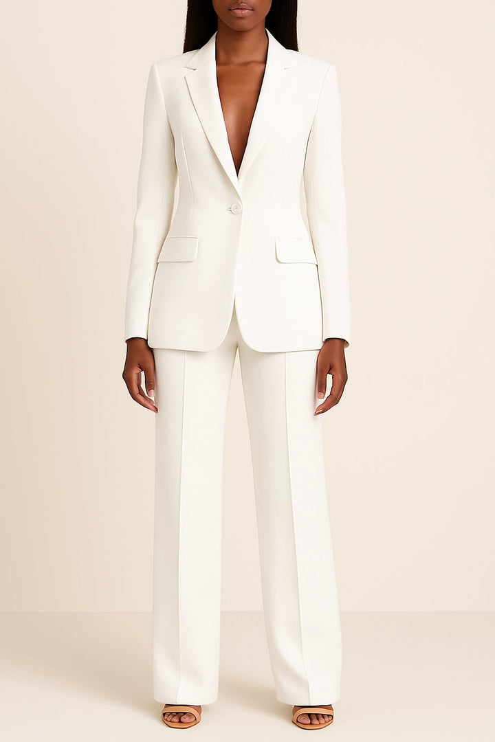 Back view of a women's elegant two-piece suit set, showing the tailored fit of the blazer and trousers for a smart, professional look.