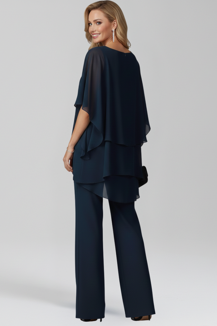 Sophisticated women's trouser set featuring a unique asymmetrical top and sleek straight-leg pants.