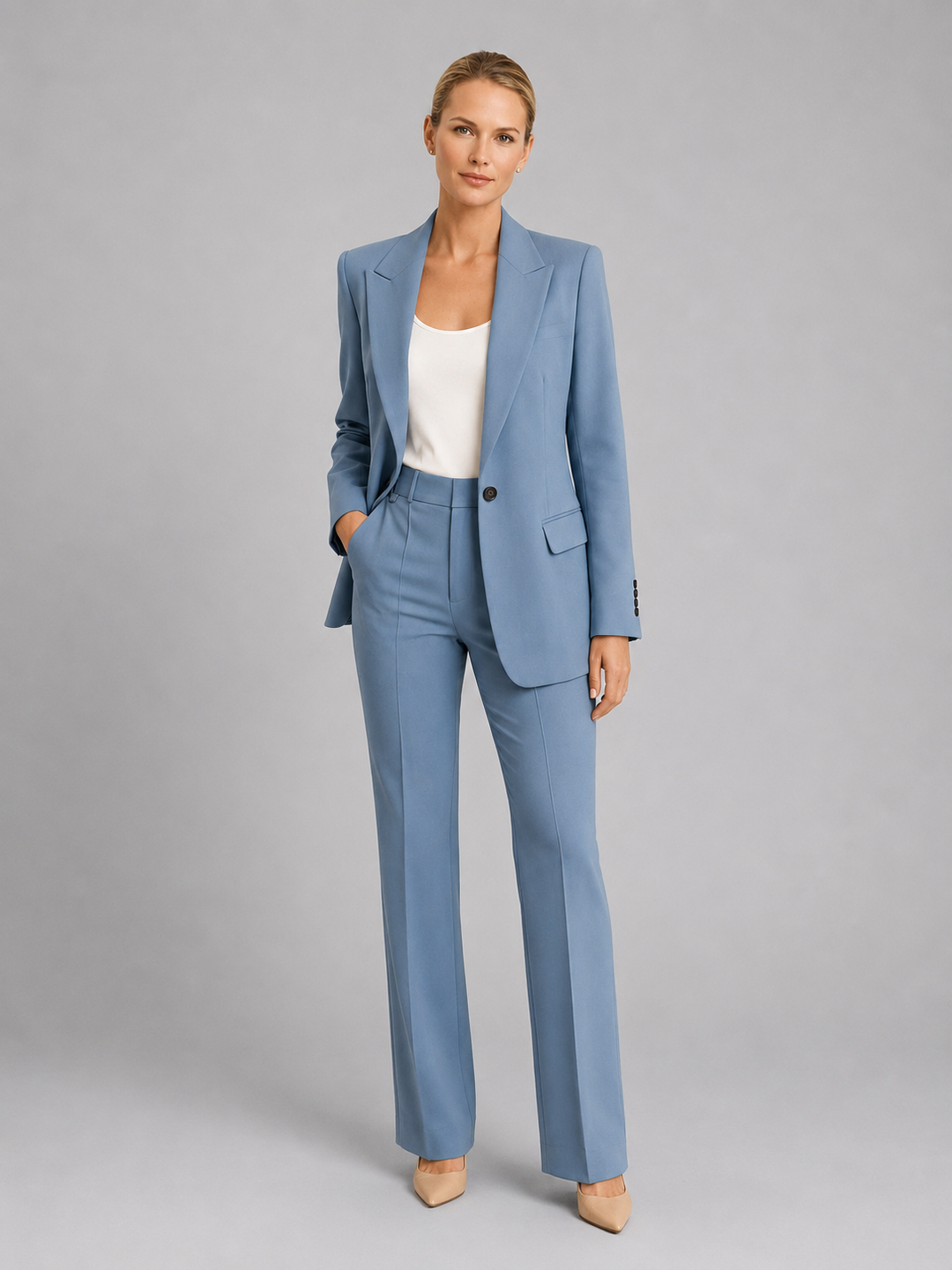 Tailored women's trouser suit featuring a chic blazer and high-waist trousers for formal wear.