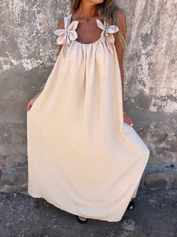 Soft, flowy fabric of an elegant women's U-neck maxi dress, comfortable for summer parties.