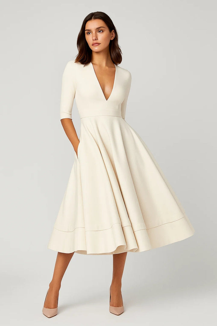 Elegant women's V-neck A-line midi dress with 3/4 sleeves, perfect for cocktail parties or wedding guests.