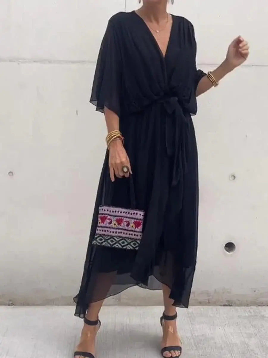 Chiffon V-neck midi dress for women, featuring a flattering belted waist, perfect for elegant party wear.