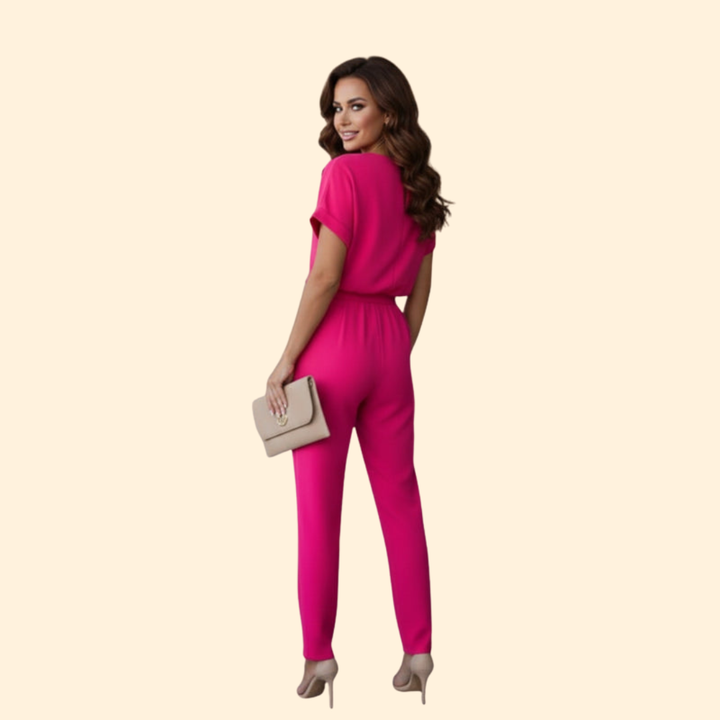 Fashionable women's belted jumpsuit featuring a chic V-neckline and comfortable wide-leg design.