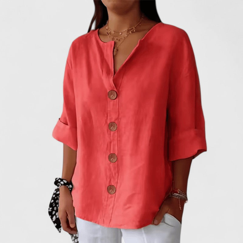 Fashionable ladies V-neck blouse, button-front design, perfect for elegant casual or spring office looks.