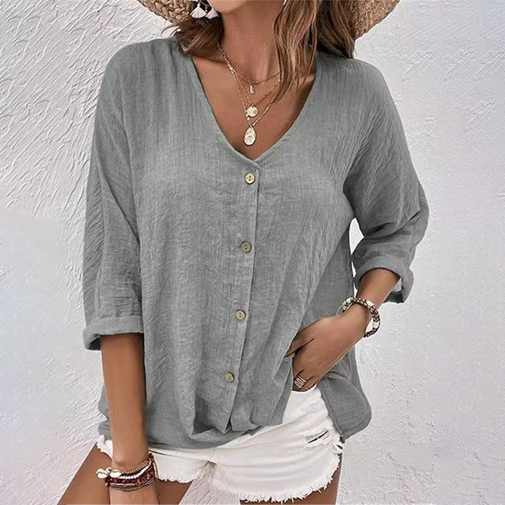 Comfortable women's 3/4 sleeve V-neck blouse for elegant everyday wear and versatile fashion.