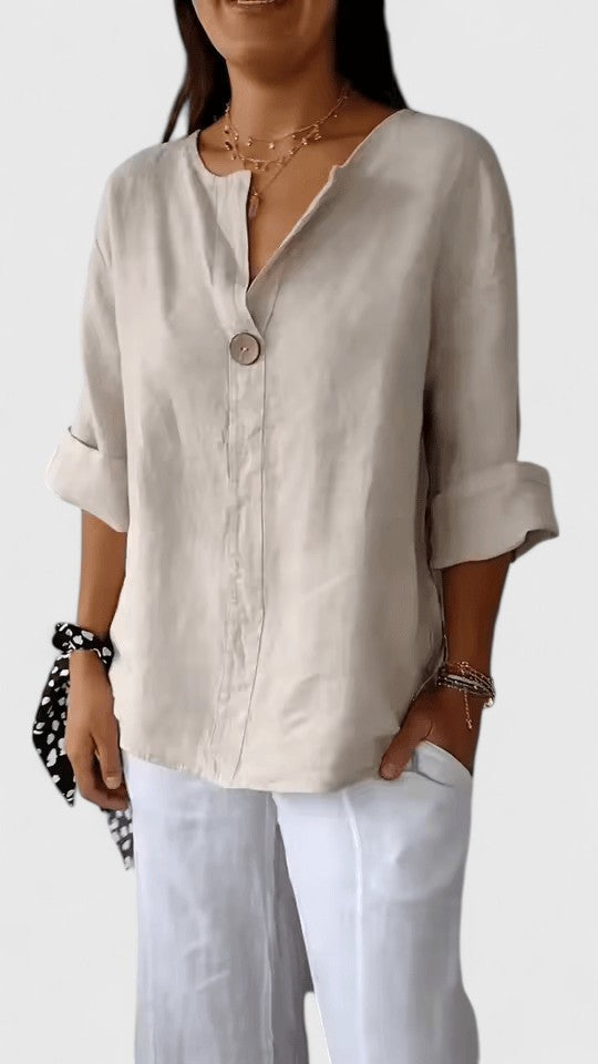 Fashionable V-neck knot blouse for women, a chic and elegant short sleeve top with a relaxed fit.
