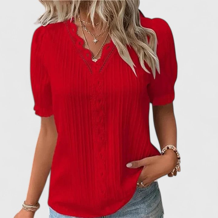 Comfortable women's short sleeve V-neck top with fashionable hollow sleeves, great for everyday elegant wear.
