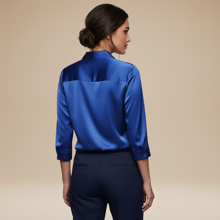 Ladies V-neck blouse in a classic style, offering an elegant and comfortable fit.