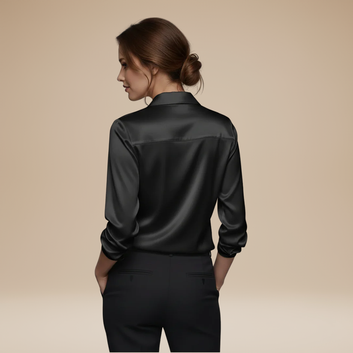 Stylish V-neck blouse for ladies, offering a timeless and elegant silhouette.