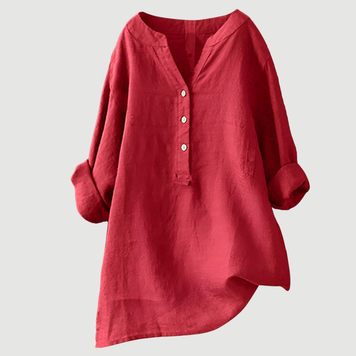 Elegant women's V-neck button-down shirt with long sleeves. Chic casual top for versatile everyday wear.