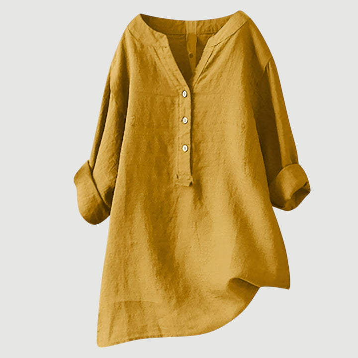 Refined V-neck button-down women's shirt. Chic long sleeve top, perfect for elegant casual summer outfits.