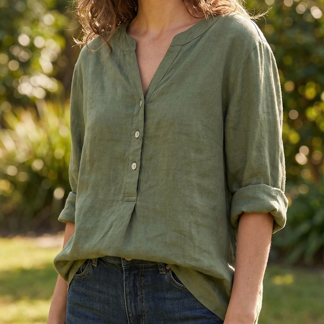 Versatile women's button-down V-neck shirt. Long sleeve top suitable for casual or elegant everyday wear.