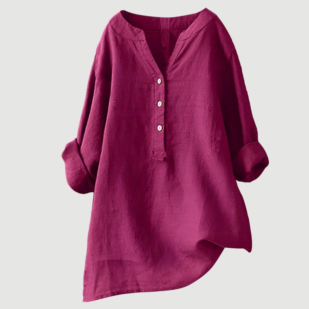 Chic women's V-neck shirt, relaxed fit, button-down style. Comfortable long sleeve casual top for all seasons.