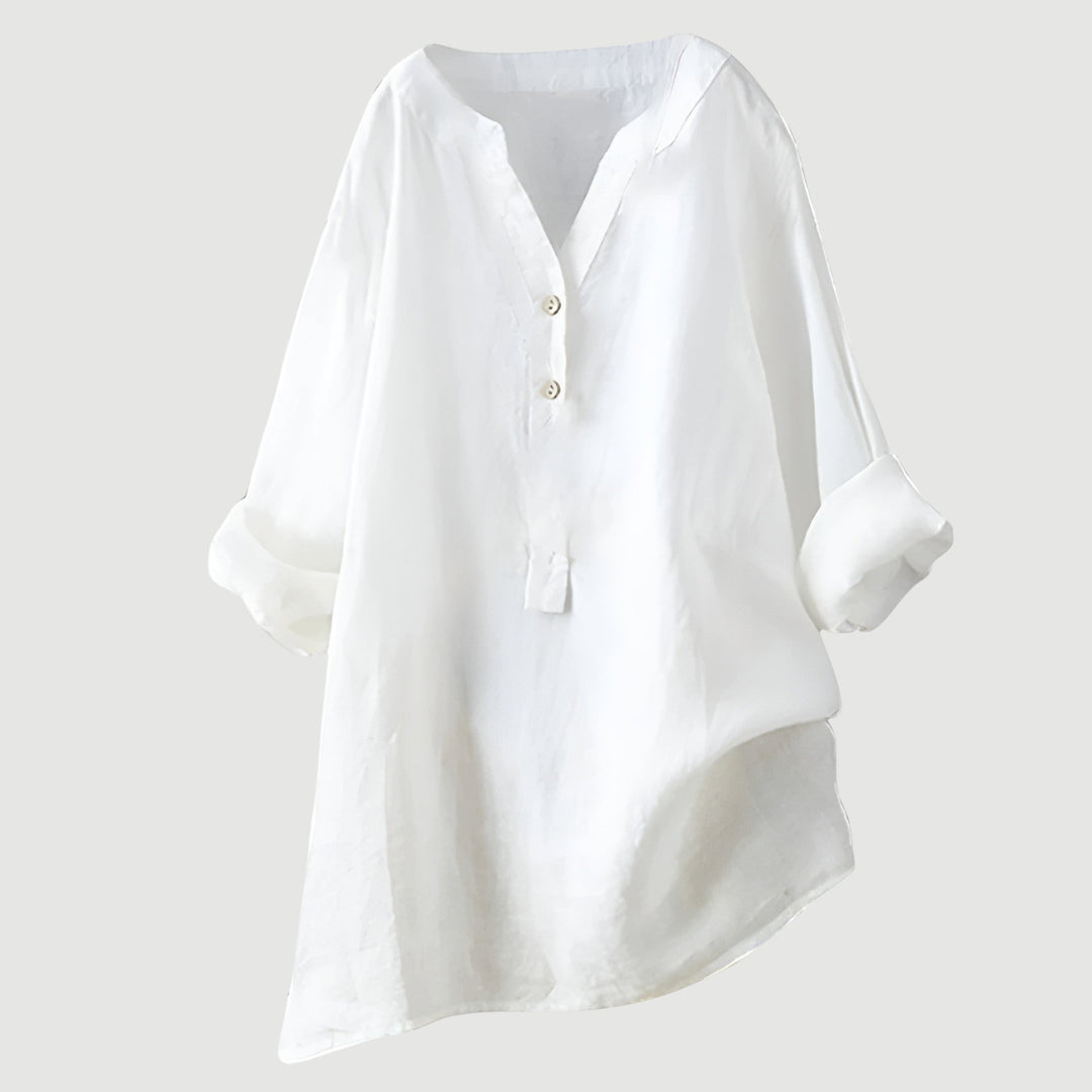 Spring/Summer women's V-neck button-down shirt. Relaxed fit long sleeve top for elegant casual style.