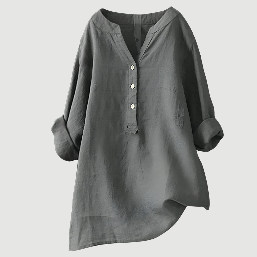 Fashionable women's V-neck button-down shirt. Long sleeve casual top, elegant and versatile for everyday chic.
