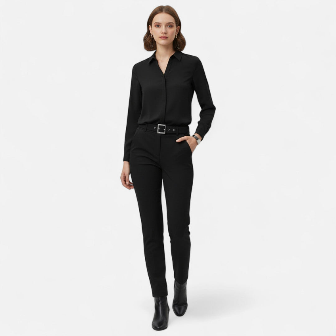 Sophisticated V-neck blouse for women, featuring a tailored fit and button-up front.
