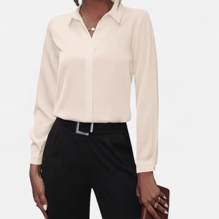 Chic women's V-neck blouse, a stylish button-up top for modern workwear and casual looks.