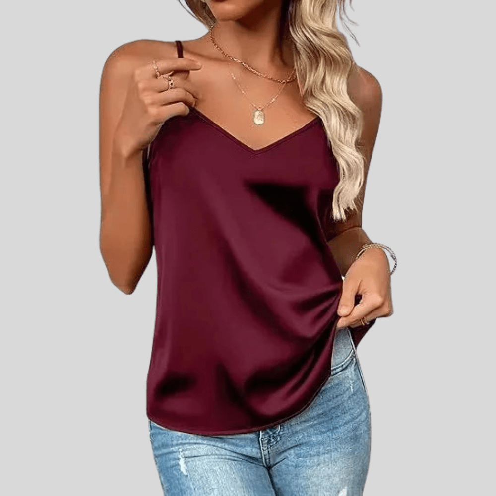 Chic women's V-neck camisole, an elegant sleeveless top with adjustable straps, ideal for warm weather or layering.