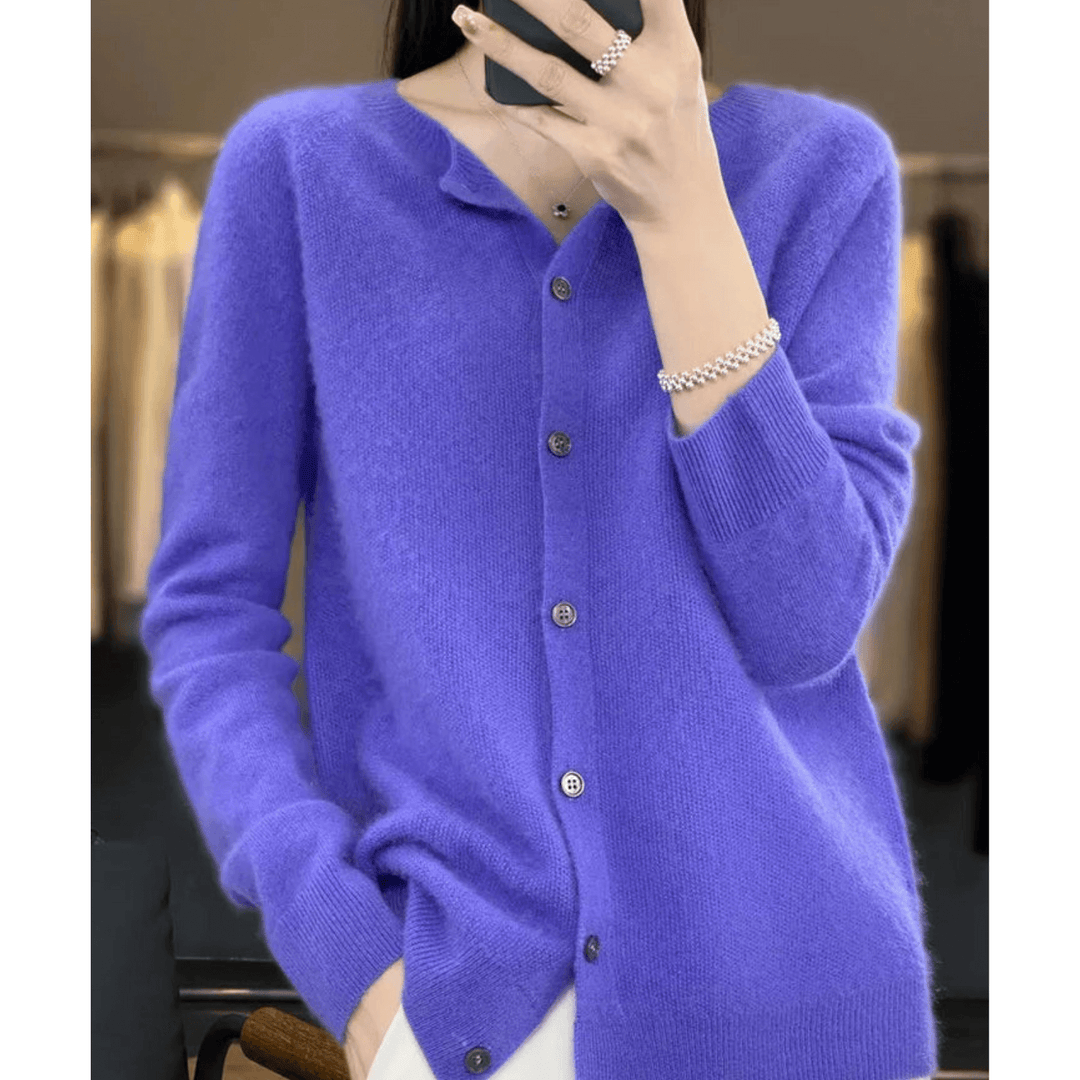Elegant women's V-neck cardigan for versatile layering. Comfortable long sleeve button-up sweater.