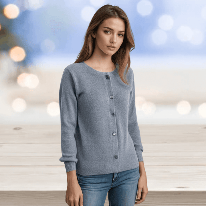 Women's V-neck button-up cardigan. Solid color, long sleeve, elegant for versatile layering.