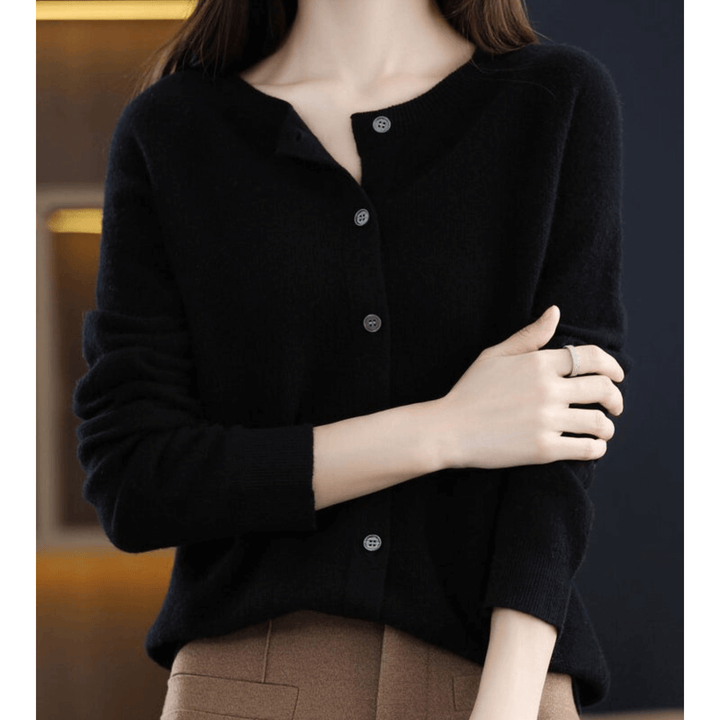 Women's long sleeve V-neck cardigan. Solid color, comfortable & elegant for versatile layering.