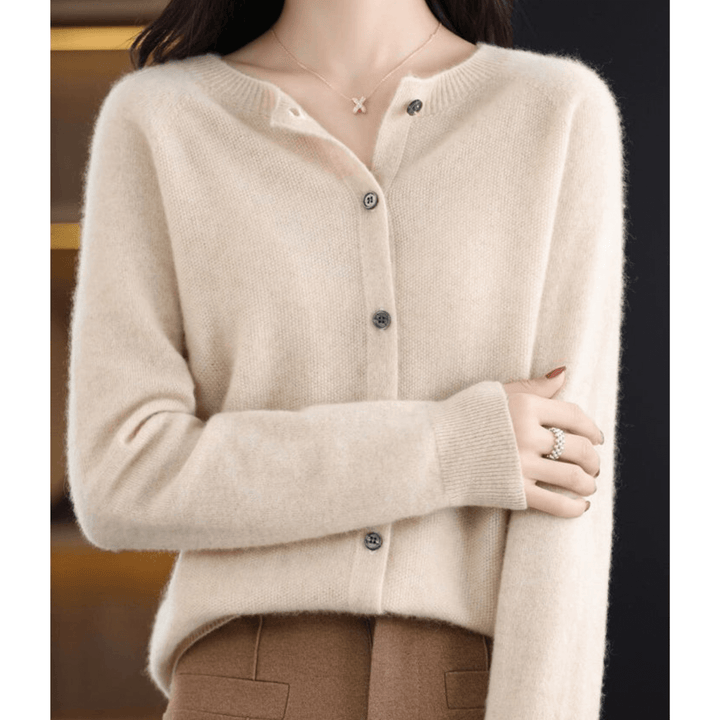 Elegant solid color V-neck cardigan for women. Long sleeve sweater, chic and versatile layering.