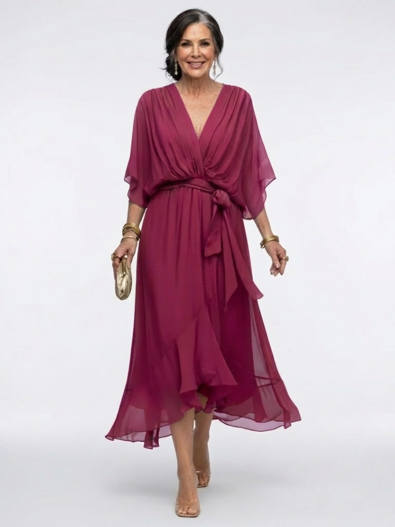 Detailed shot of the draped waist tie on a comfortable V-neck short sleeve midi dress, a key design element.