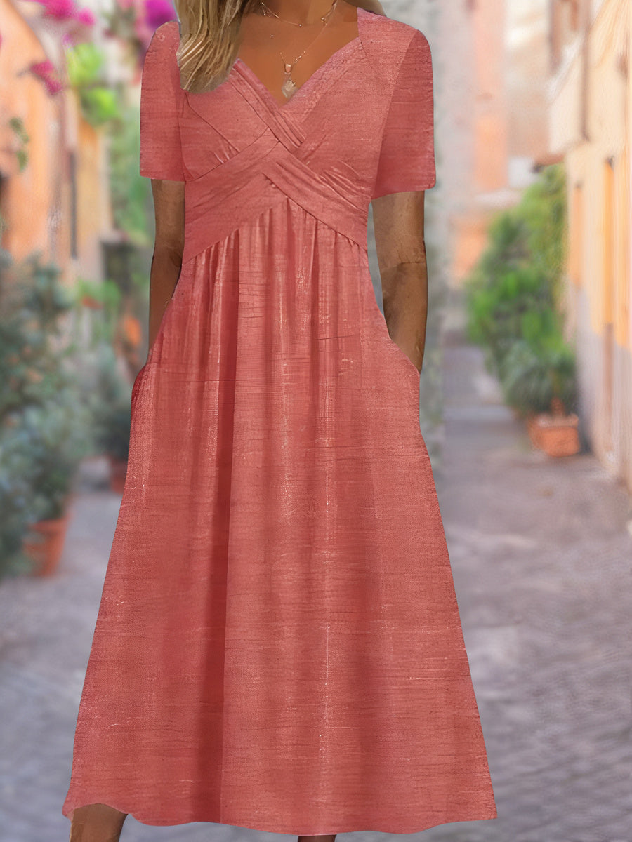 Women's flowy V-neck dress with tummy-covering design. Versatile for casual outings, summer events, or elegant spring wear.