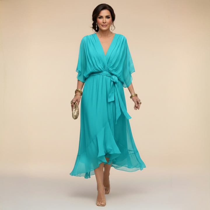 Elegant women's V-neck dress featuring stylish flowy sleeves and a flattering silhouette.