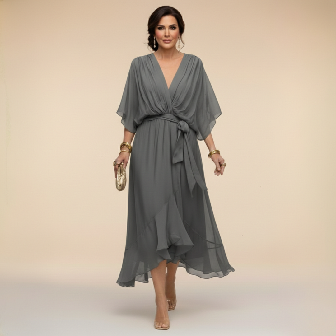 Beautiful women's elegant V-neck dress with a gorgeous flowy sleeve design, perfect for fashion.