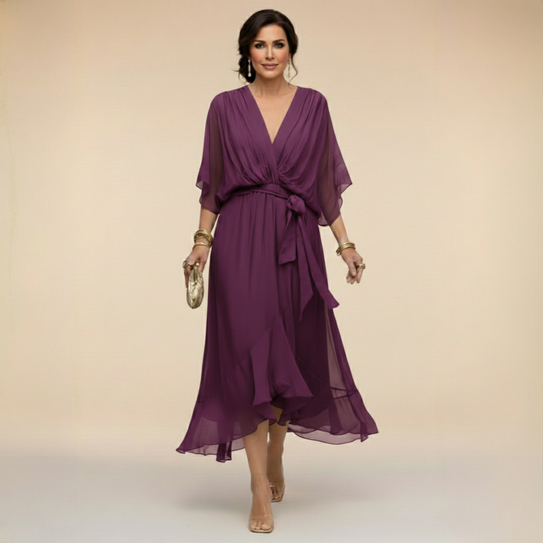 Graceful women's elegant V-neck dress with comfortable flowy sleeves, exuding sophisticated fashion.