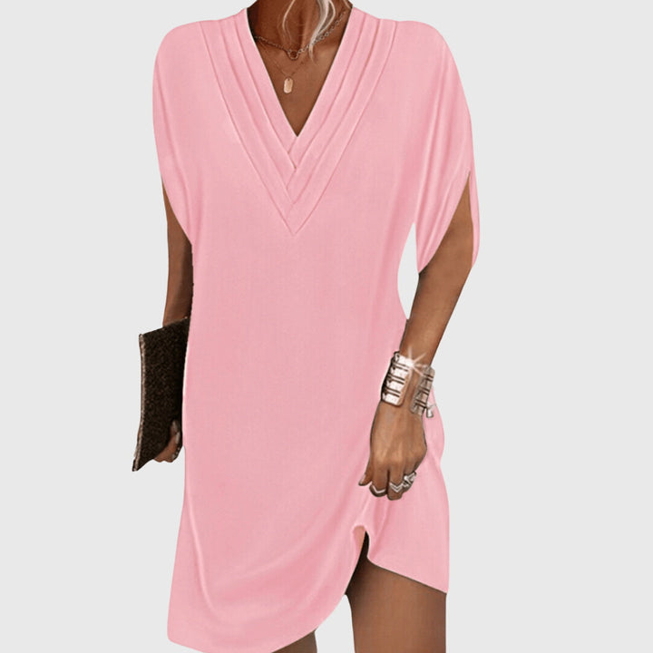 Stylish women's V-neck party dress. Elegant design with tummy control for a flattering silhouette. Perfect for fashion.