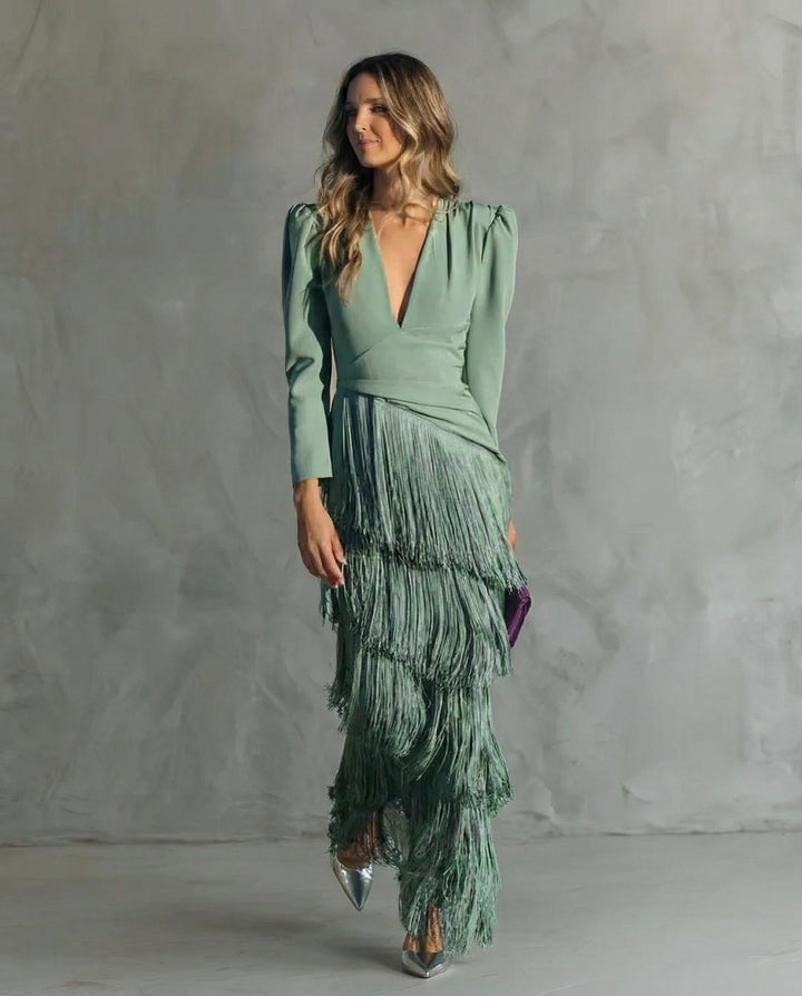 Sophisticated women's long evening gown with V-neck and fringe details, ideal for formal events.