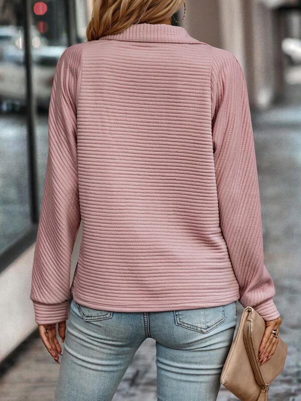 Winter wear women's v-neck half-zip sweater. Cozy, elegant jumper for comfortable & stylish cold days.
