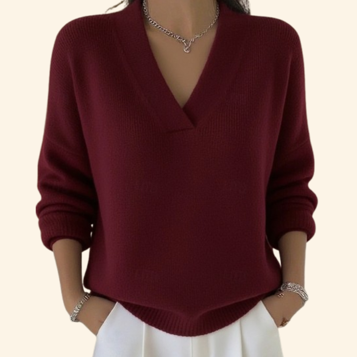 Elegant women's V-neck jumper in a soft, cozy knit. Perfect for a chic autumn or winter outfit.