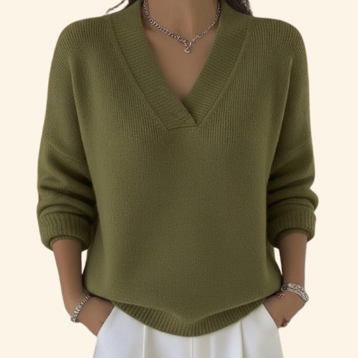 Fashionable ladies' V-neck jumper, a comfortable and warm top for autumn and winter seasons.