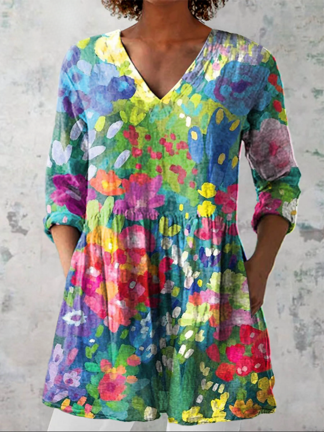 Elegant women's V-neck long blouse, fluid multicolor design for casual chic style & versatile everyday wear.