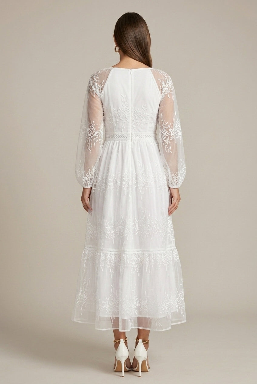 Formal women's embroidered V-neck maxi dress with long sleeves & tiered design, ideal for evening events.