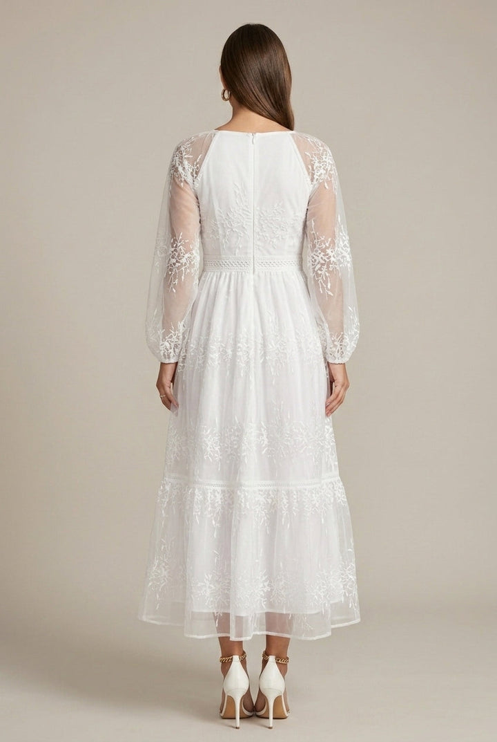 Formal women's embroidered V-neck maxi dress with long sleeves & tiered design, ideal for evening events.