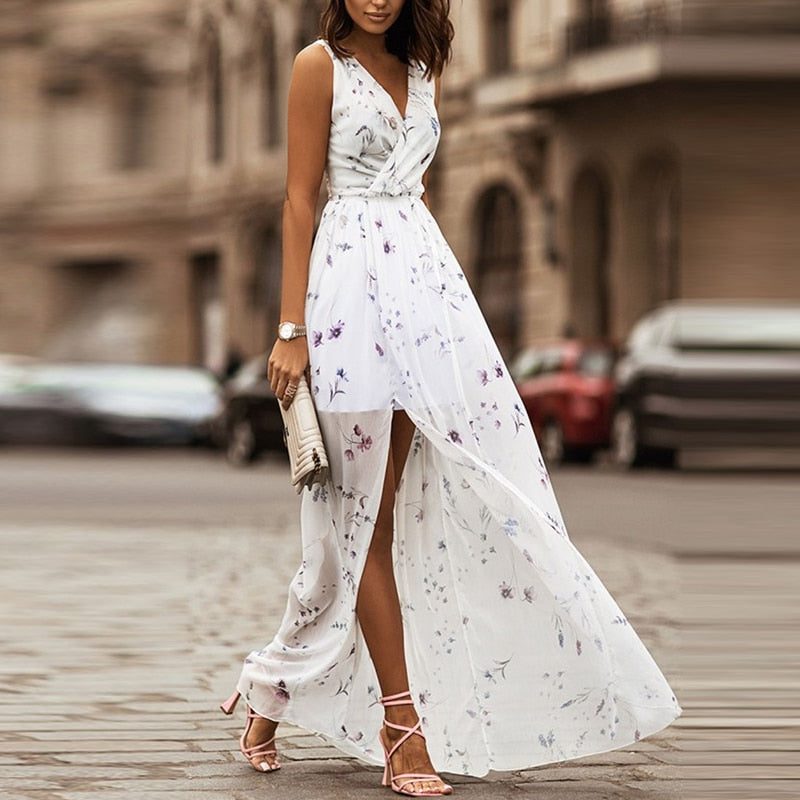 Elegant women's V-neck sleeveless maxi dress with a floral print & leg split, perfect for wedding guests & summer.