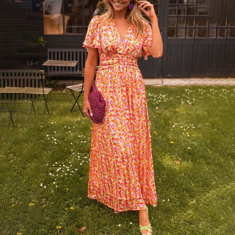 Elegant women's V-neck maxi dress, perfect for summer occasions or sophisticated casual wear.