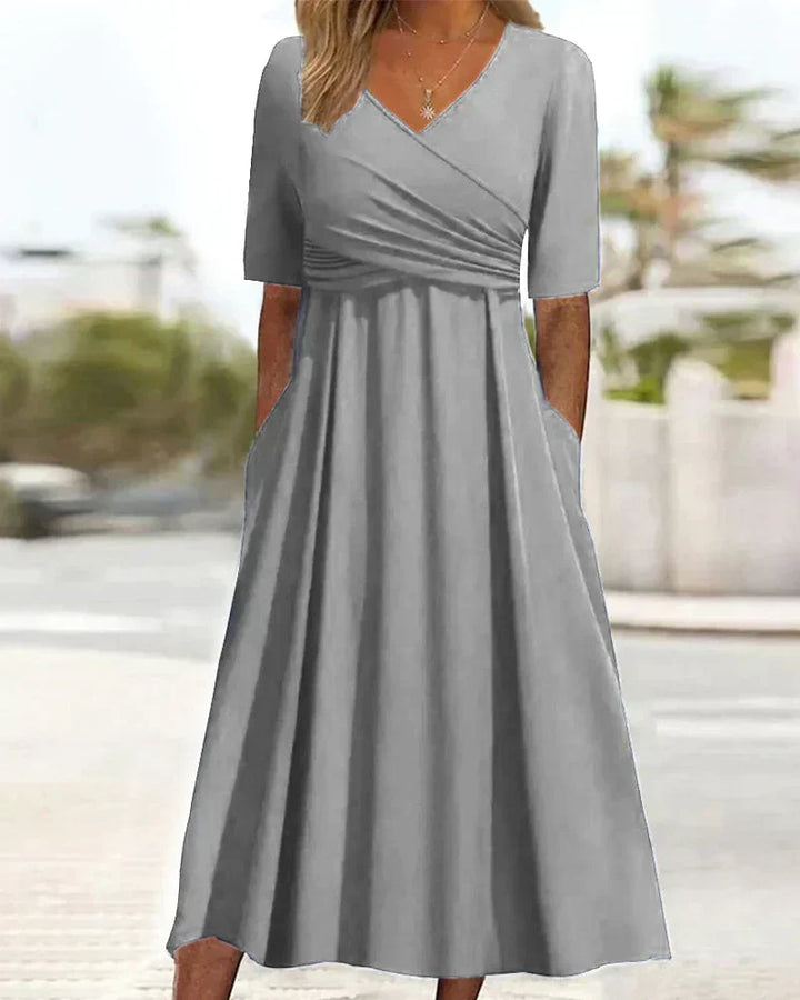 Stylish sleeveless V-neck maxi dress for women, featuring a comfortable A-line fit and practical pockets. Ideal for summer.